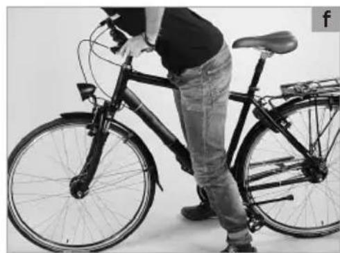 Person riding a bicycle with visible frame and seat, no text or symbols present