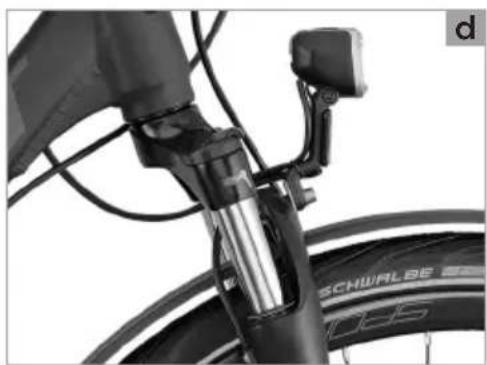 Close-up of a bicycle's front wheel and suspension bracket (no visible text or symbols)