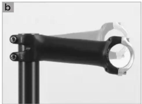 Close-up of a black mechanical lever handle with a metallic bracket and circular head (no text or symbols visible)
