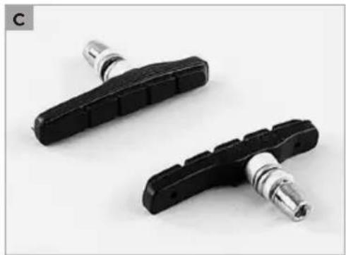 Two black bicycle tire components with metallic fittings, shown against a plain white background (no text or symbols visible)