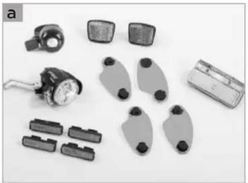 Collection of automotive electronic components and sensors laid out on a white surface (no text or symbols visible)