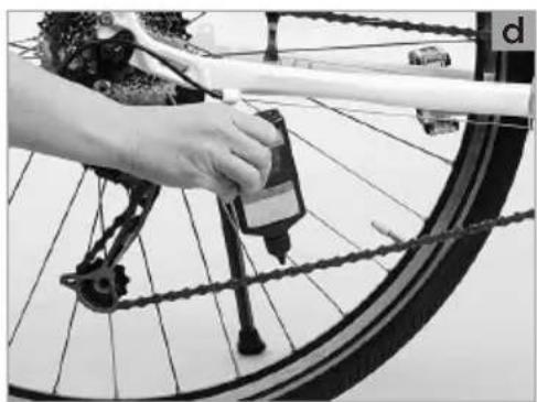 Close-up of a hand using a bicycle tire to adjust the wheel rim (no visible text or symbols)