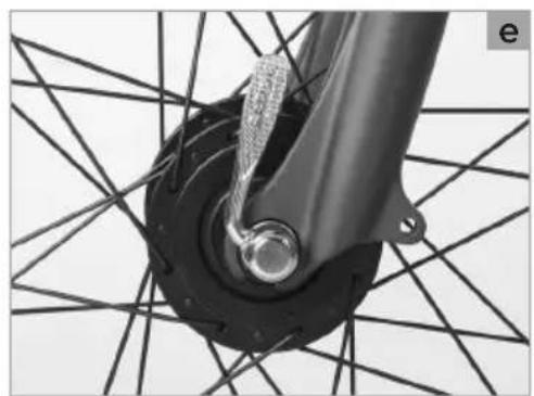 Close-up of a bicycle wheel and suspension mechanism with mesh grid background (no text or symbols)