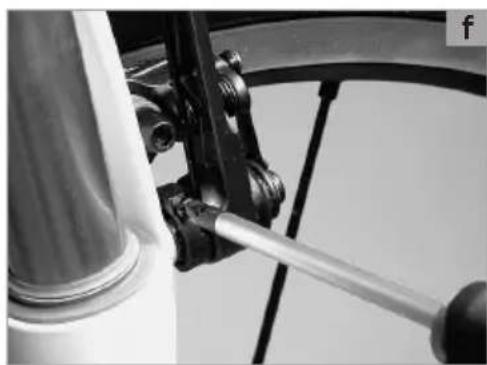 Close-up of a bicycle wheel and bicycle frame with visible mechanical components (no text or symbols)