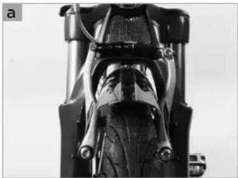 Close-up of a motorcycle's front wheel and side brackets (no visible text or symbols)
