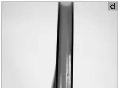 Close-up of a vertical metallic rod or pipe with a visible crack, against a plain background (no text or symbols)