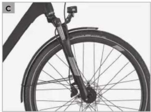 Close-up of a bicycle's front wheel and rear suspension, showing spokes and wheelbase (no text or symbols)
