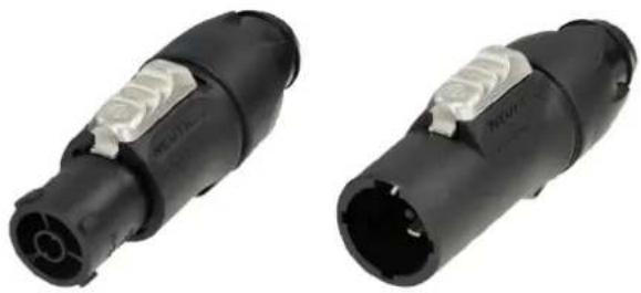 Two black electrical connectors with visible internal contacts and terminal ports (no text or symbols)