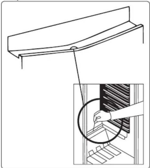Technical line drawing of a mechanical component with an inset showing a hand holding a circular object (no text or symbols present).