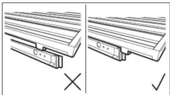 Technical diagram showing two views of a structural component with cross and check symbols (no text or labels)
