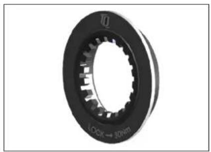 Close-up of a black mechanical gear or bearing with visible teeth and central bore (no text or symbols)