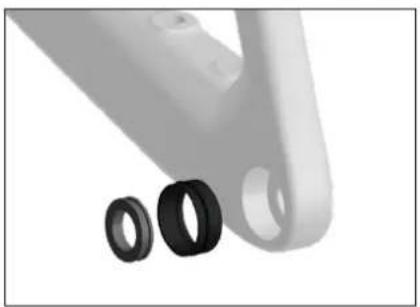 Close-up of a mechanical component with two black circular rings and a cylindrical end (no text or symbols visible)