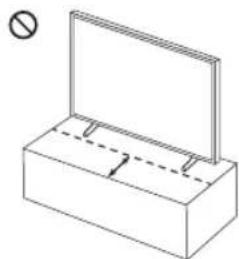 Simple line drawing of a rectangular box with a flat top and a dashed line indicating a measurement or alignment (no text or symbols).