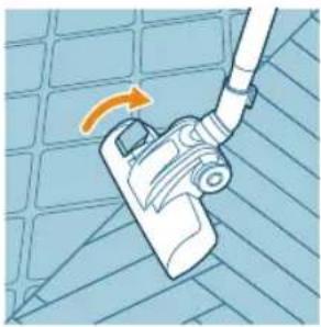 Illustration of a vacuum cleaner with an orange arrow indicating rotation. No text or symbols.