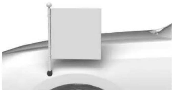 Close-up of a metallic tool interacting with a rectangular object, possibly a stand or knob (no visible text or symbols)