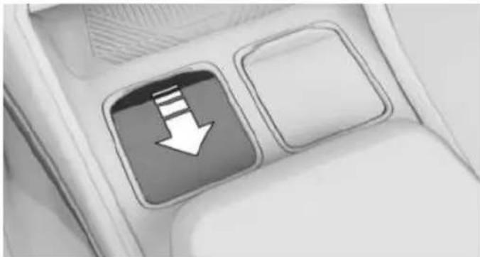 Close-up of a car interior panel with a black square button labeled 'Down' and a white square on the right side (no text or symbols beyond the icon)