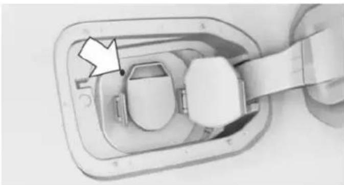 Top-down view of a device component with a handle and internal components (no visible text or symbols)