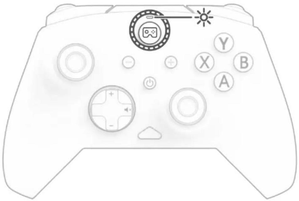 Line drawing of a game controller with labeled buttons and a sun icon (no text or symbols beyond basic UI elements)