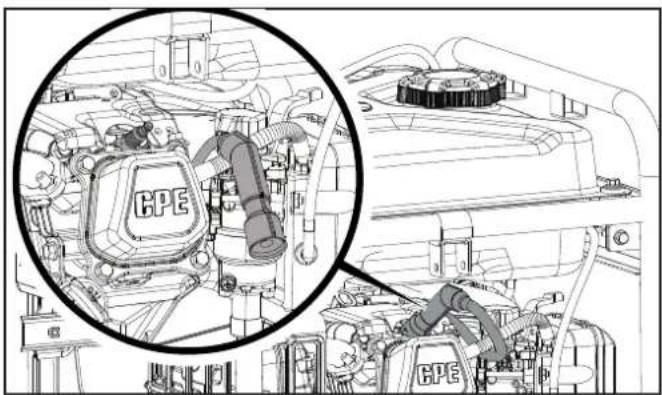 Technical line drawing of an engine compartment showing internal components and a magnified inset (no text or symbols)
