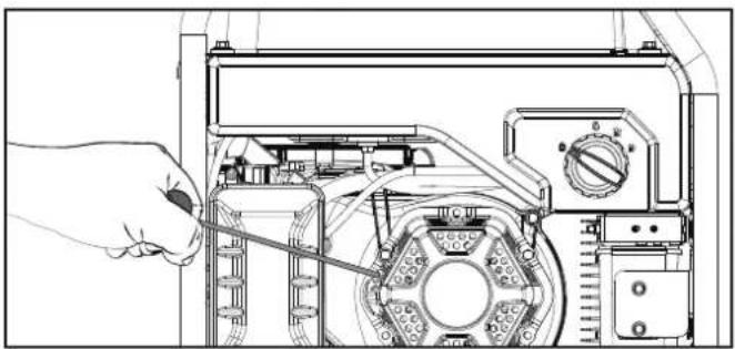 Line drawing of a hand operating a mechanical device with a cable inserted (no text or symbols visible)
