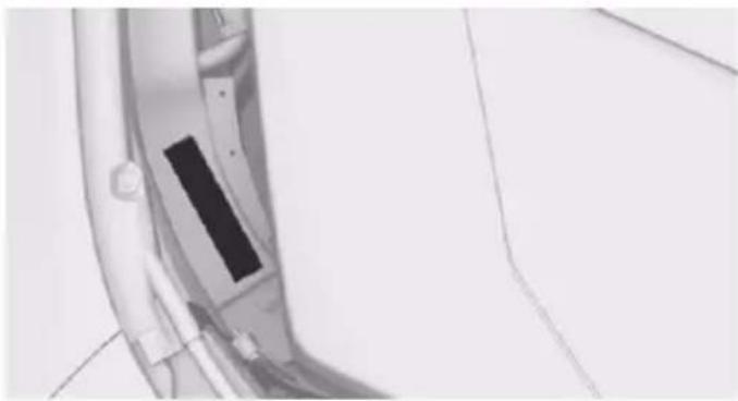 Close-up of a mechanical component with a rectangular slot and mounting holes (no visible text or symbols)