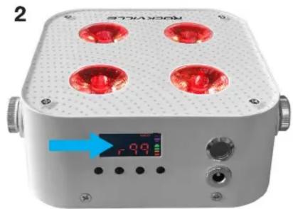 Exterior view of a modern rooftop device with four red fluorescent bulbs and a digital display showing 7.00V (no readable text or symbols)