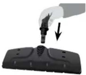 Hand holding a screwdriver above a black electronic device with ports, no visible text or symbols