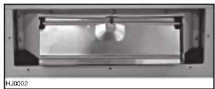 Exterior view of a rectangular mechanical component with internal channels and a central circular feature (no visible text or symbols)