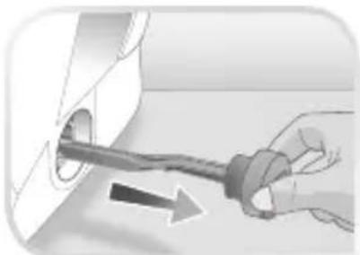 Hand holding a screwdriver inserted into a socket (no text or symbols visible)