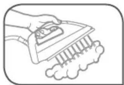 Line drawing of a hand using an iron on a surface with a cloth underneath (no text or symbols)