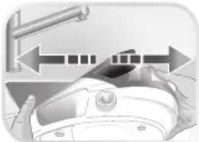 Illustration of a hand holding a helmet with directional arrows indicating movement or process (no text or symbols)