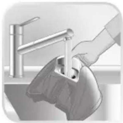 Illustration of a hand using a tool to clean or adjust a stainless steel faucet (no text or symbols visible)
