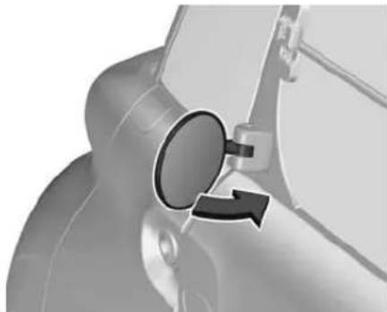 Close-up of a mechanical component with a circular feature and directional arrow (no text or symbols)