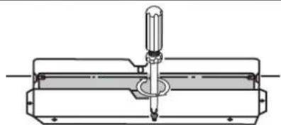 Technical line drawing of a mechanical assembly with a central tool and flange (no text or symbols)