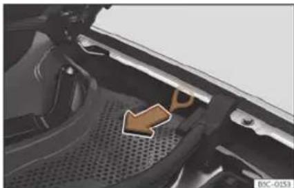 Close-up of a car engine compartment with a highlighted arrow pointing to a component (no visible text or symbols)