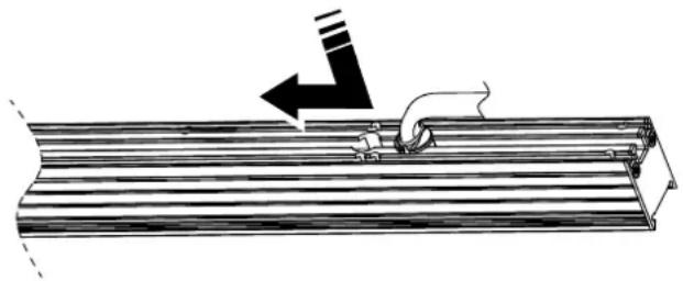 Diagram of a mechanical assembly with a hand holding a tool, showing a right-hand rule (no text or symbols present)