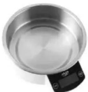 Top-down view of a stainless steel kitchen scale with digital display (no text or symbols visible)