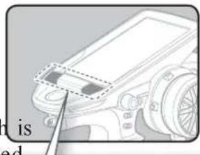 Diagram of a car interior with a highlighted panel and a pointing arrow (no text or symbols)