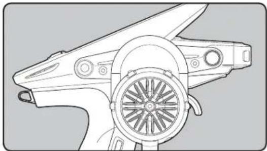 Technical line drawing of a mechanical device with a circular component and fan (no text or symbols)