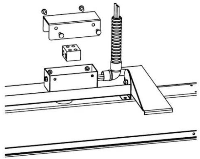 Technical line drawing of a mechanical assembly with rollers, blocks, and alignment lines (no text or symbols)