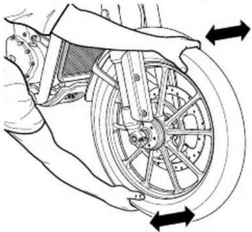 Technical line drawing of a bicycle wheel assembly with directional arrows indicating motion (no text or symbols)