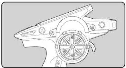 Technical line drawing of a mechanical component with a central hub and circular dial (no text or symbols)