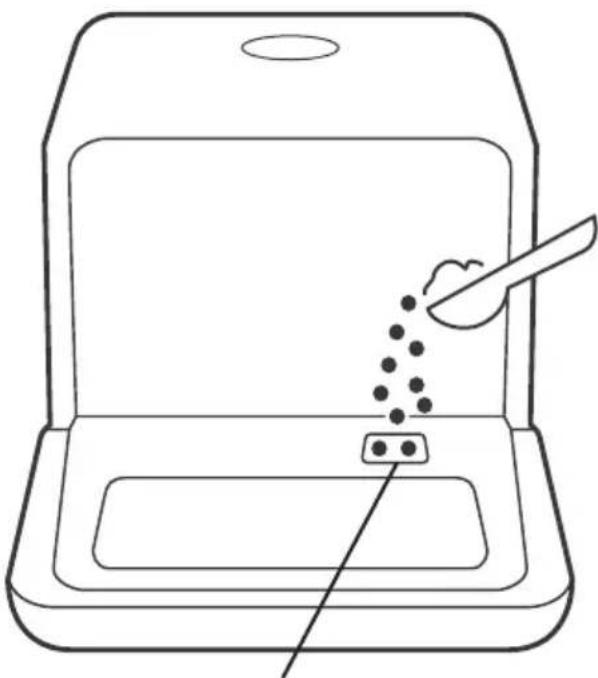 Line drawing of a laptop with a spoon and digital particles inserted into the screen (no text or symbols).