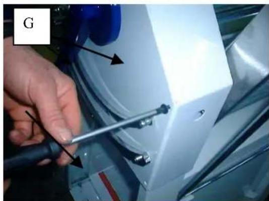 Close-up of a hand using a screwdriver to adjust or install a white mechanical component (no visible text or symbols)