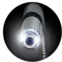 Close-up of a cylindrical mechanical component with bright central bore and textured outer ring (no visible text or symbols)