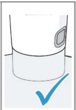 Simple line drawing of a cylindrical container with a square patch and a blue checkmark below (no text or symbols).
