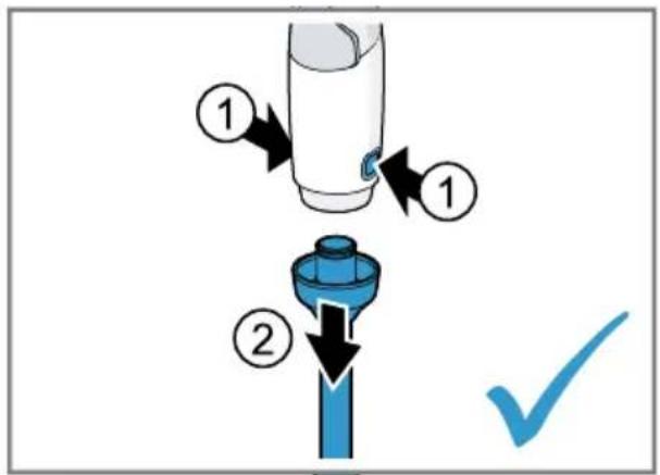 Diagram showing a hairdryer tool with two steps: adding one to a blue cap and adding another to a blue stick, with a checkmark indicating the process.