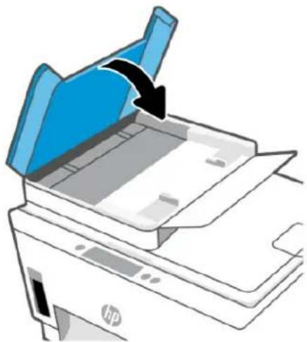 Illustration of an HP printer with a blue cover and arrow indicating compression or disassembly (no text or symbols).