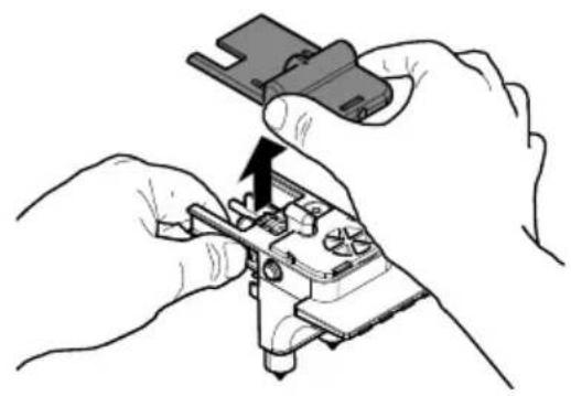 Illustration of hands using a mechanical tool to adjust or install a component (no text or symbols visible)