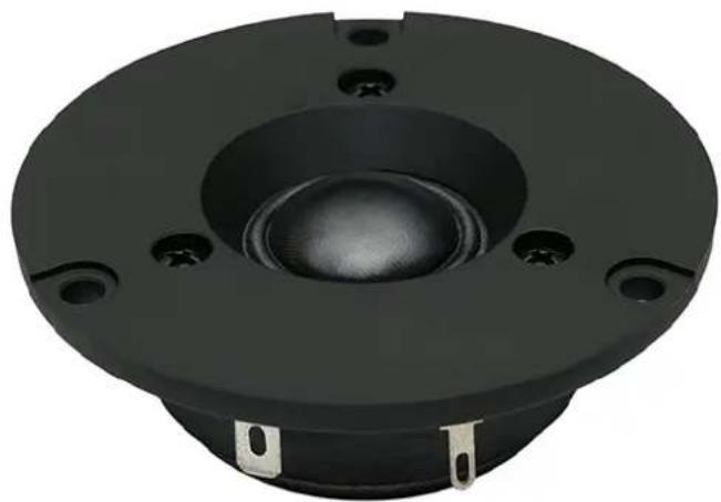 Close-up of a black speaker component with central bore and four mounting holes (no text or symbols visible)